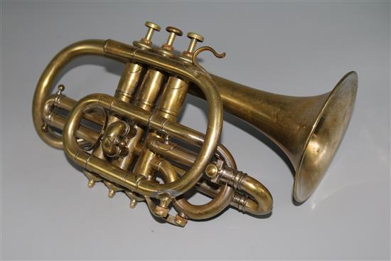 A brass cornet in case, unmarked